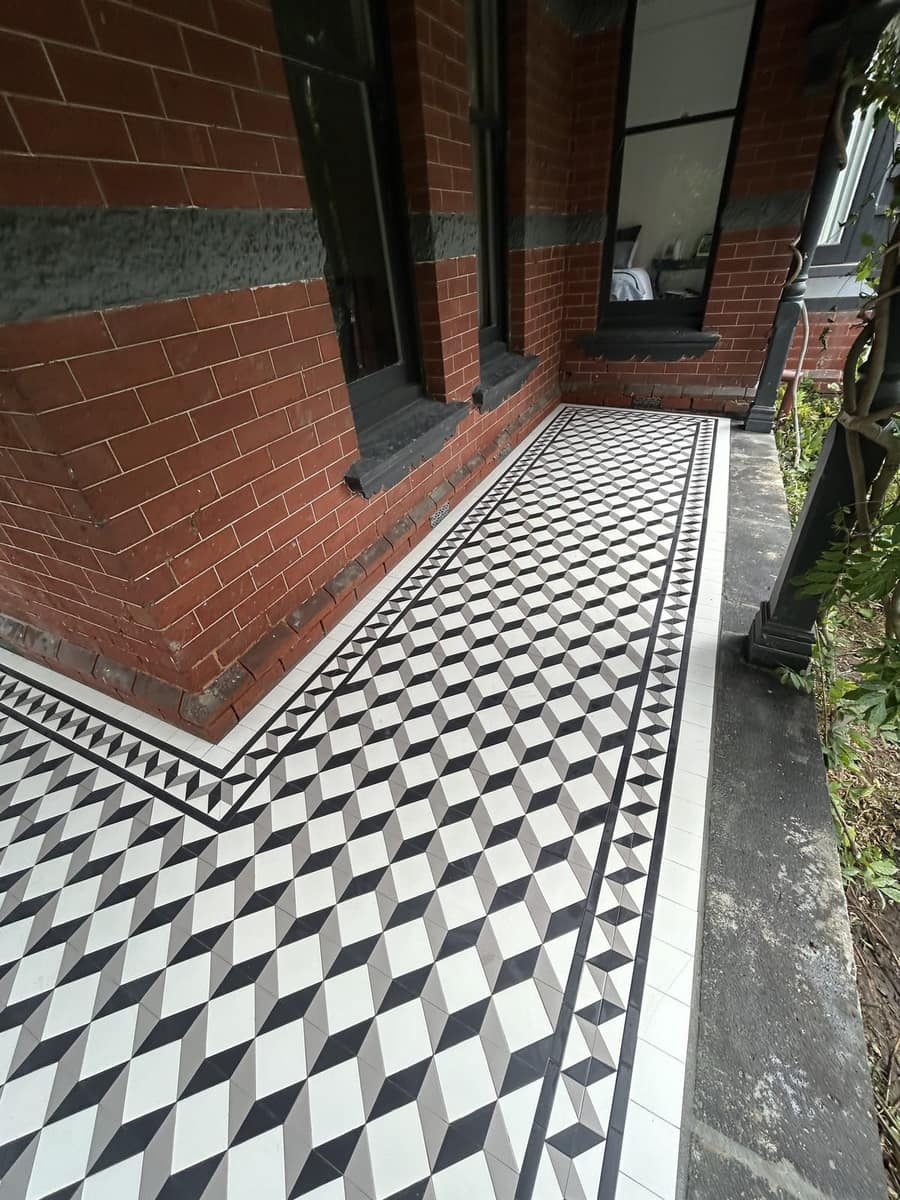 Corner of a three-tone tessellated checkerboard verandah reading as cubes, Hawthorn